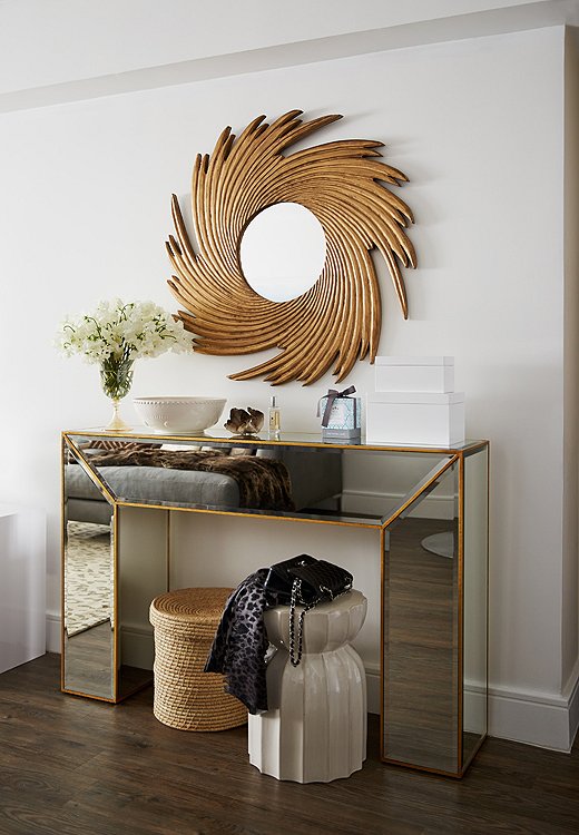 When tucked beneath an entryway console, a garden stool can be a repository for your bag or keys when it’s not being otherwise used. Photo by Tony Vu; design by Andrew Stewart.
